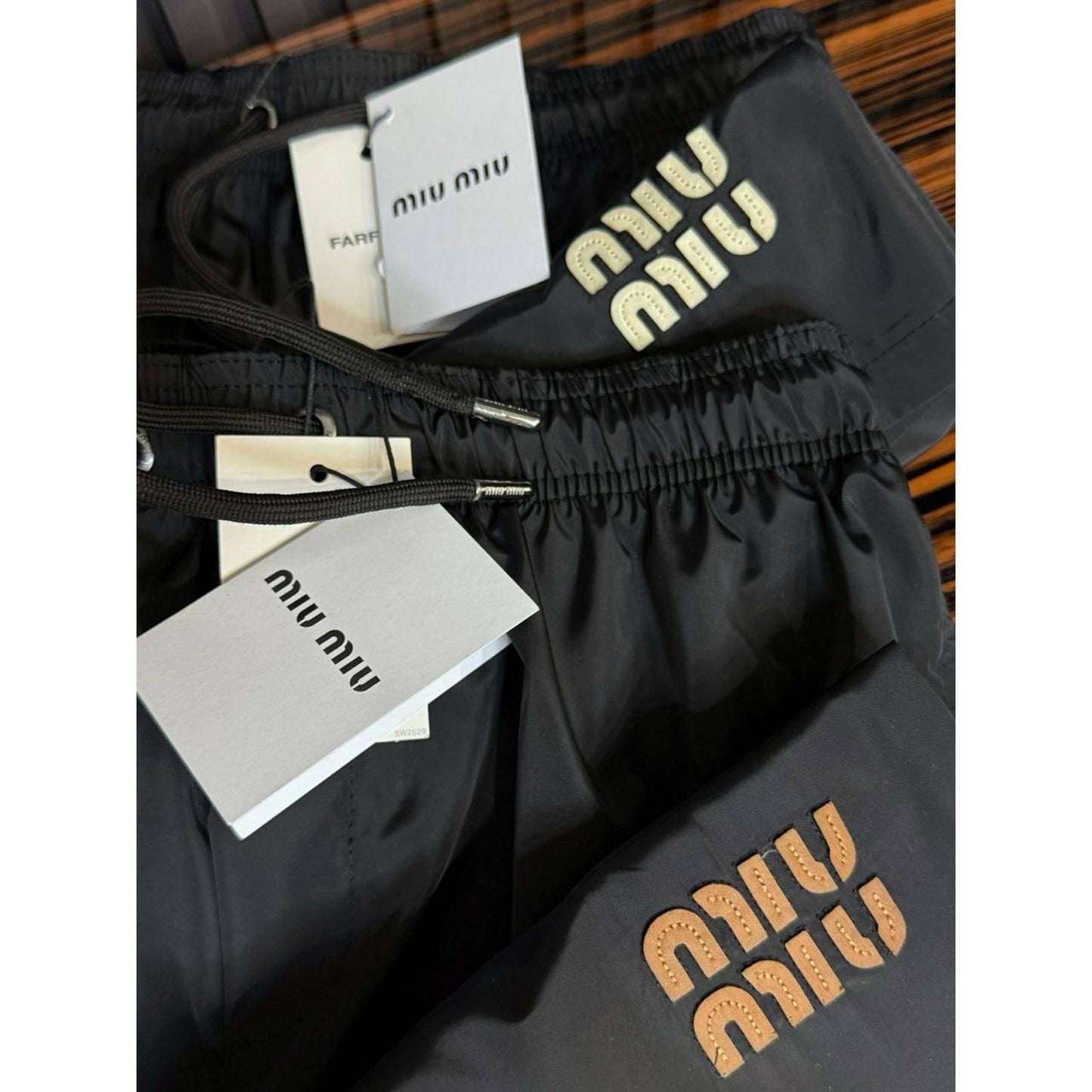 Black Swimwear with Brown Logo