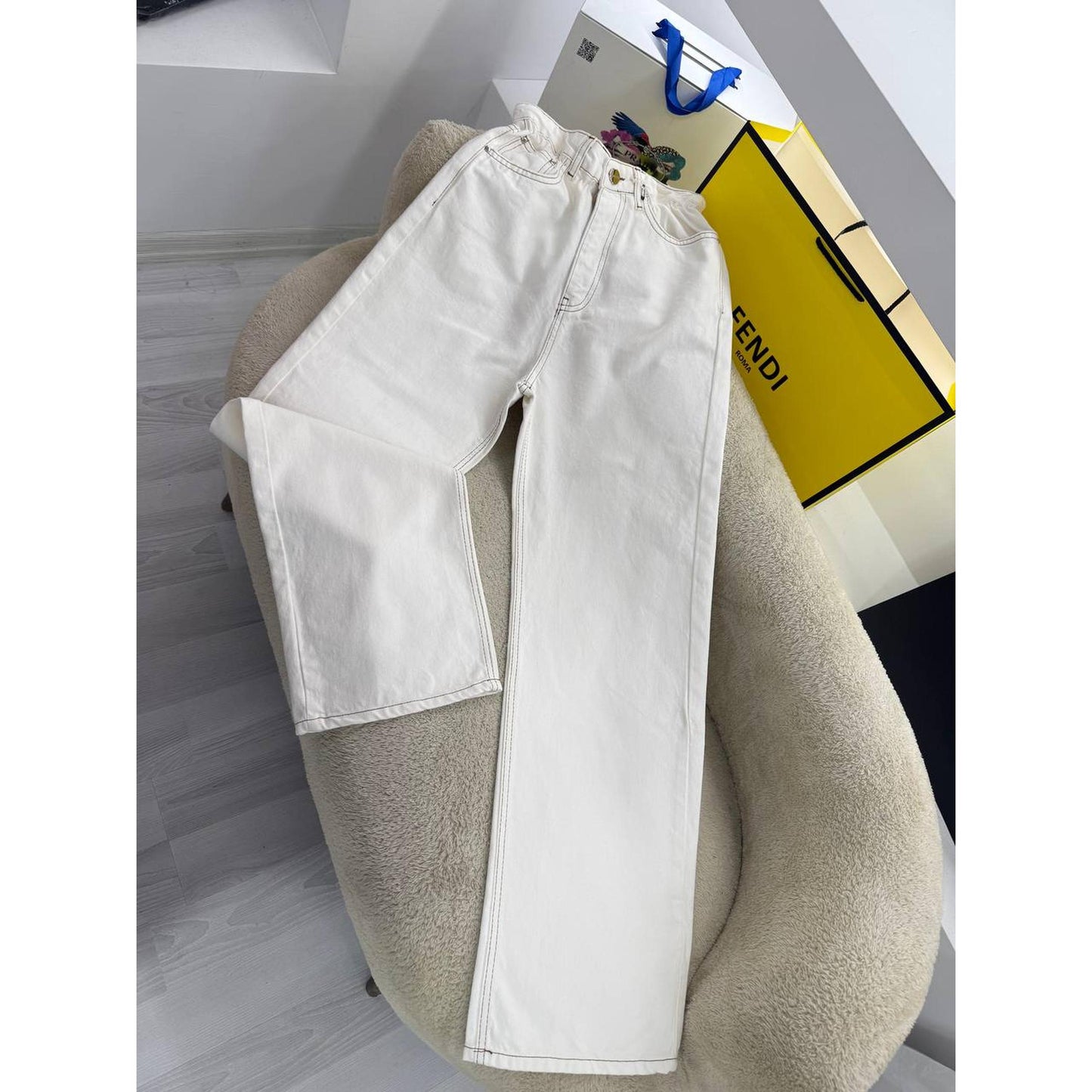 White Women’s Jeans with Orange Logo