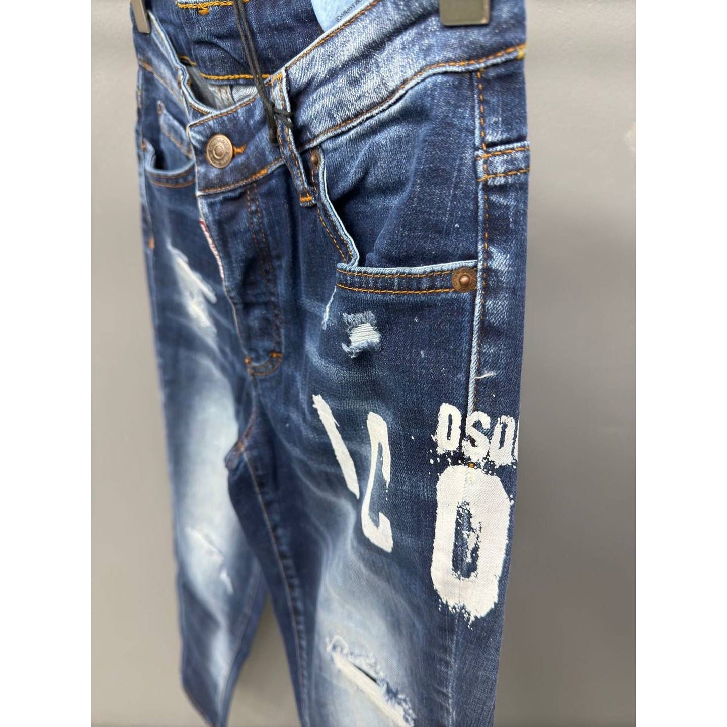 Blue Ripped Jeans with sprayed logo