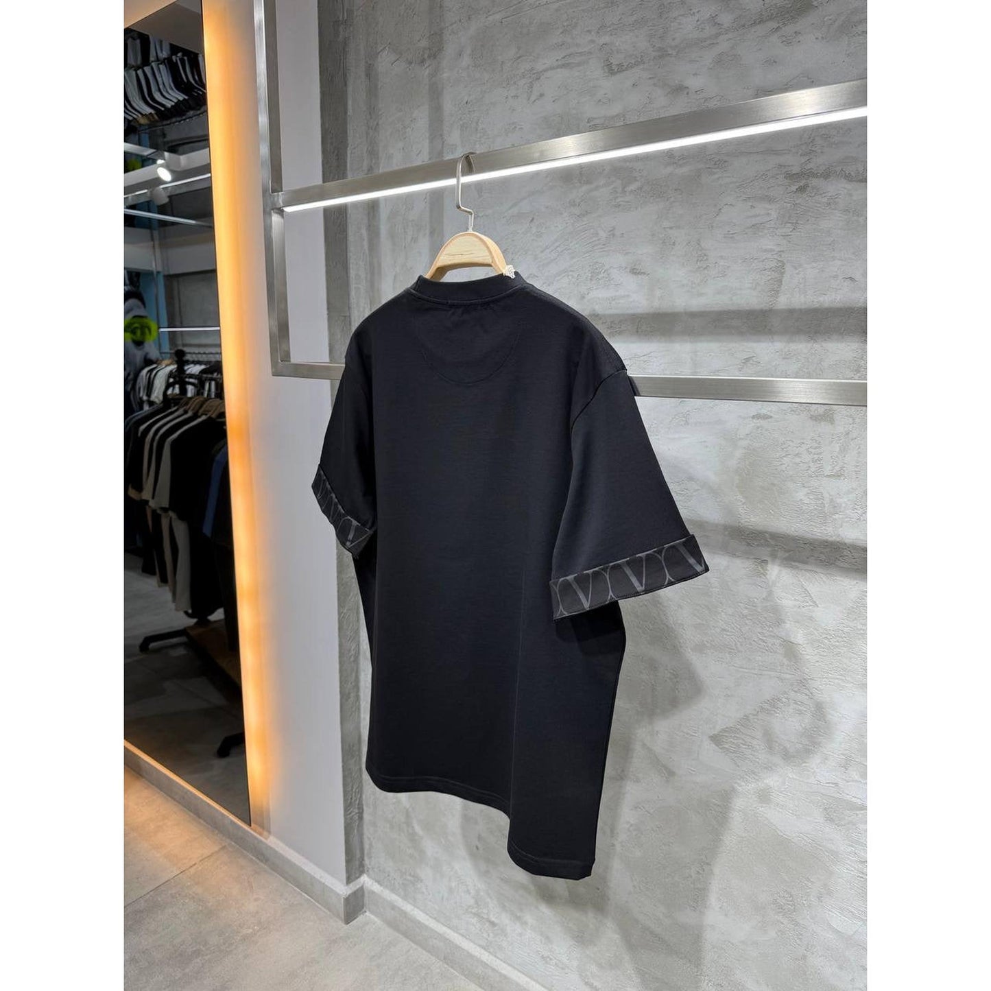 Black Oversized T-Shirt with Logos on the Sleeves